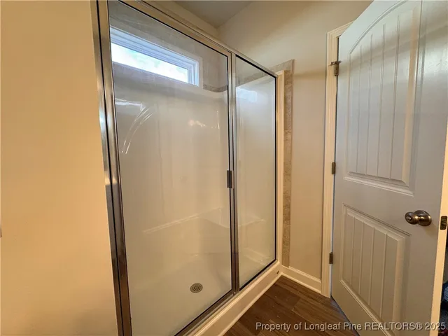 a view of empty room with windows