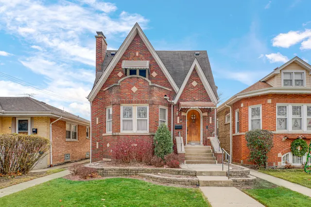 front view of a house with a yard