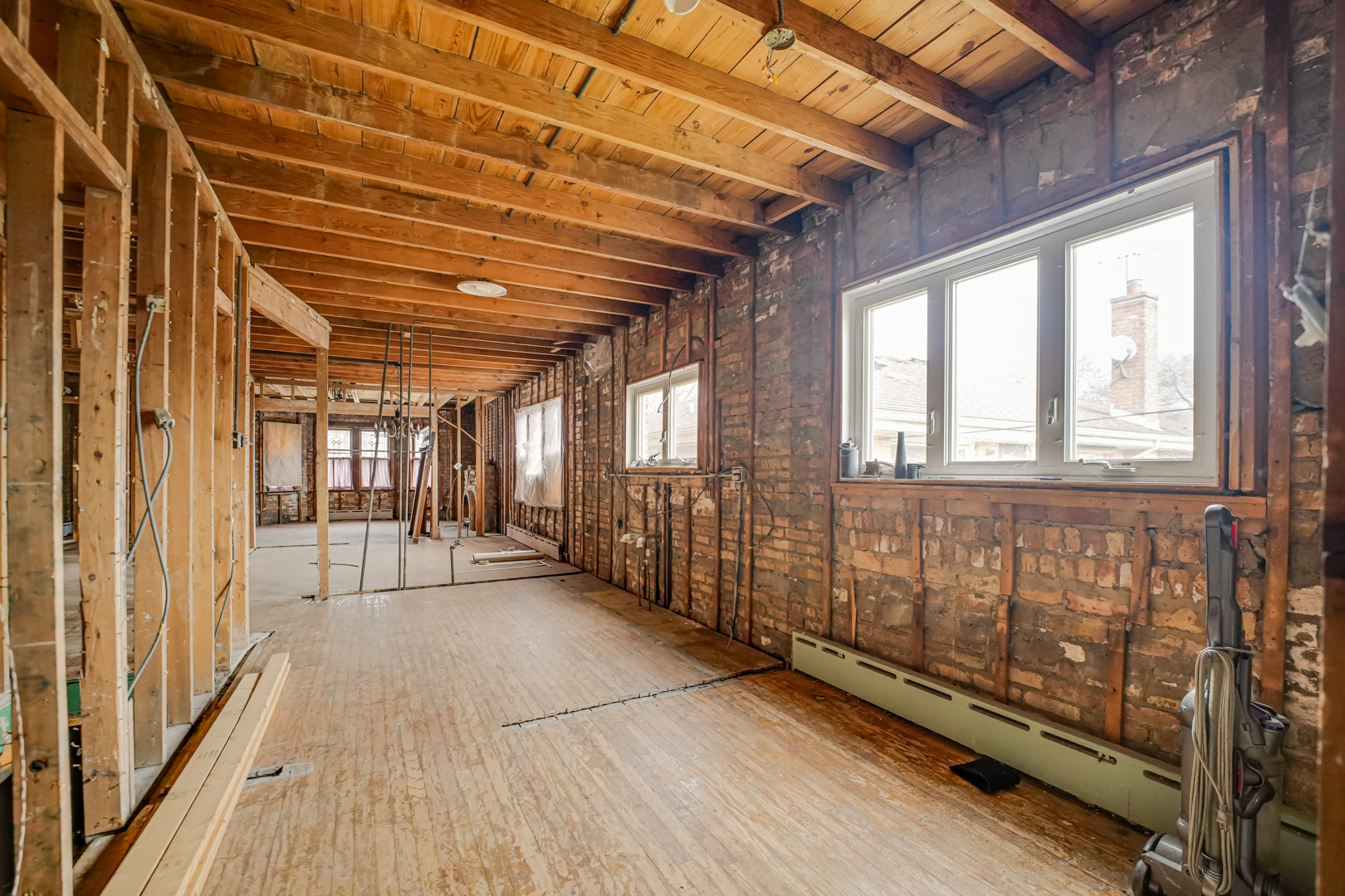 6025 West Matson Avenue Chicago, IL 60646 - Photo 7 of 19 a view of a porch with wooden floor