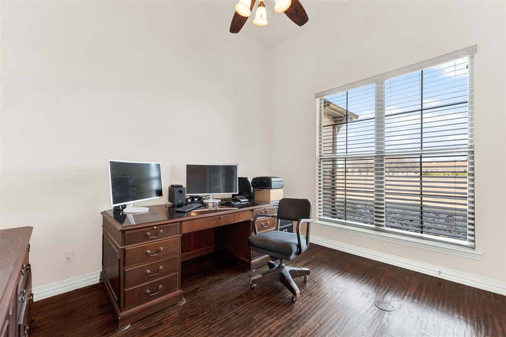 834 Audra Circle Rhome, TX 76078 - Photo 15 of 33 a view of a workspace with furniture and a window