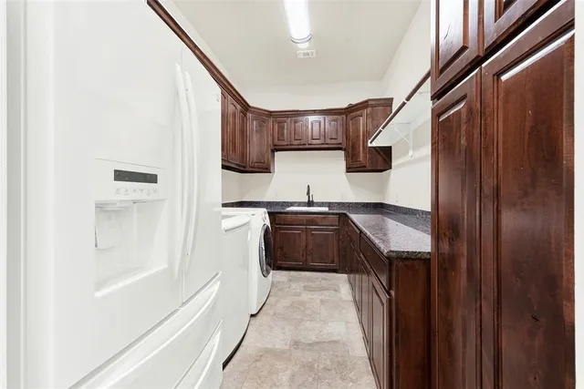 a view of a backyard with swimming pool