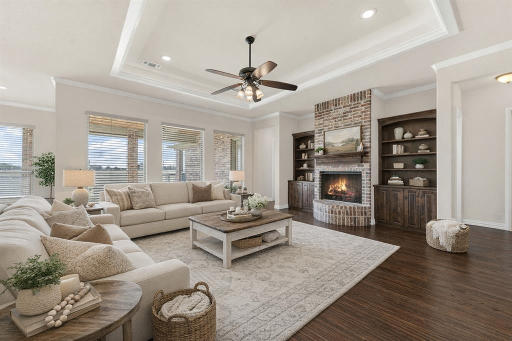 834 Audra Circle Rhome, TX 76078 - Photo 3 of 33 a living room with furniture and a fireplace