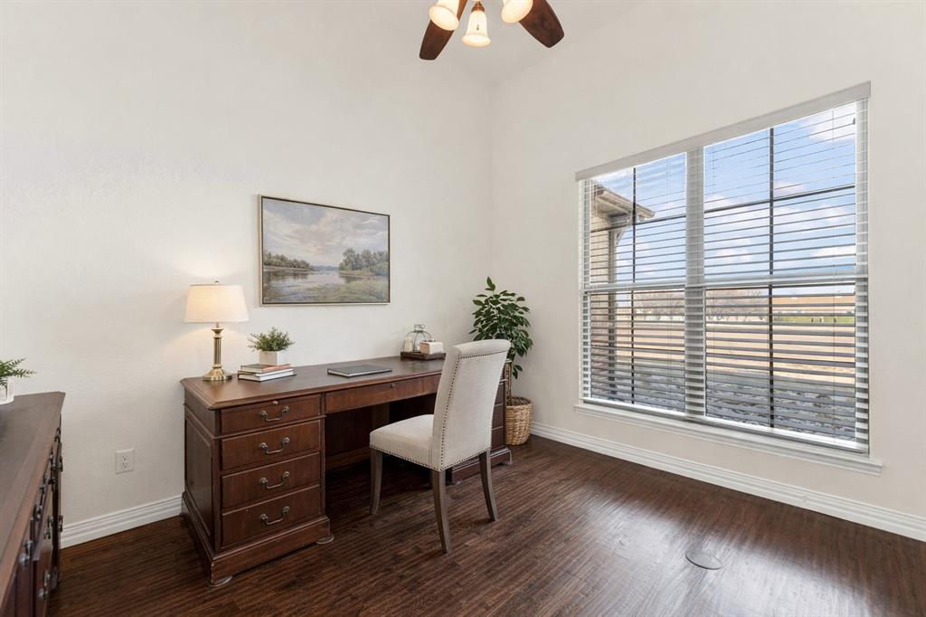 834 Audra Circle Rhome, TX 76078 - Photo 9 of 33 a view of a workspace with furniture and a window