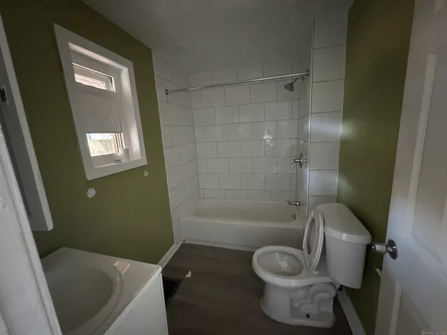 a bathroom with a sink and a toilet