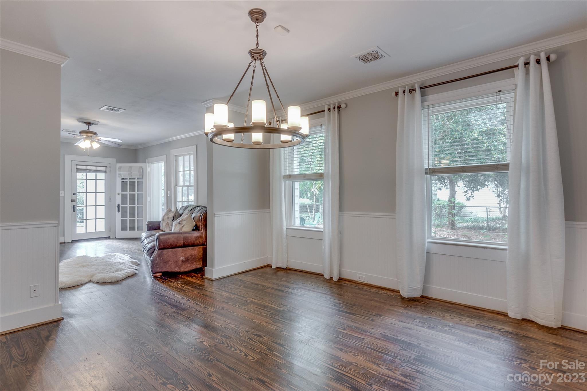 102 Grier Street Fort Mill, SC 29715 - Photo 13 of 47 a view of empty room with wooden floor and fan