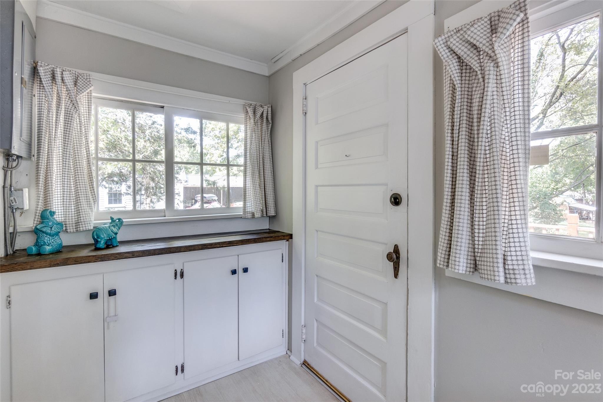 102 Grier Street Fort Mill, SC 29715 - Photo 19 of 47 a bathroom with a sink a mirror and next to a window