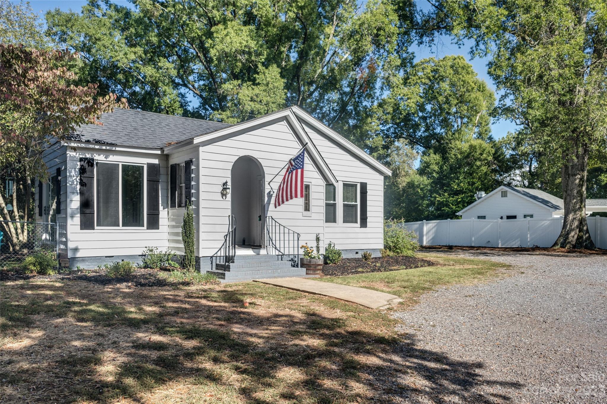 102 Grier Street Fort Mill, SC 29715 - Photo 2 of 47 a view of a house with backyard and sitting area
