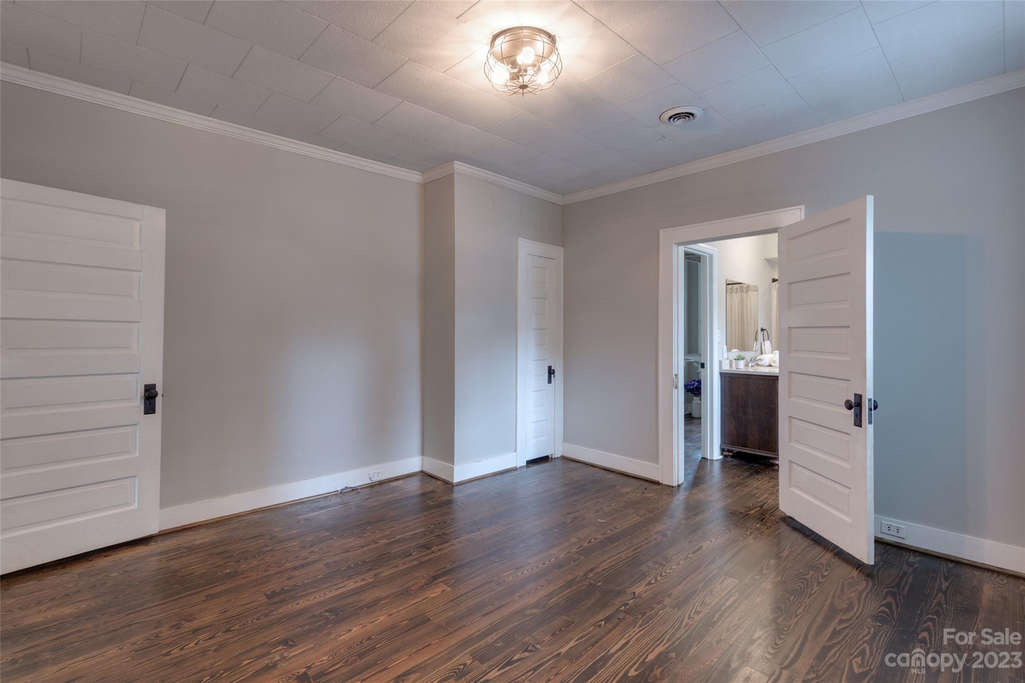 102 Grier Street Fort Mill, SC 29715 - Photo 30 of 47 a view of an empty room with wooden floor and closet