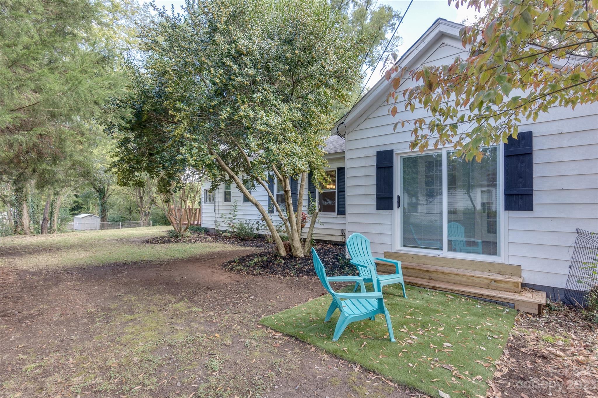 102 Grier Street Fort Mill, SC 29715 - Photo 38 of 47 a view of a house with backyard and sitting area