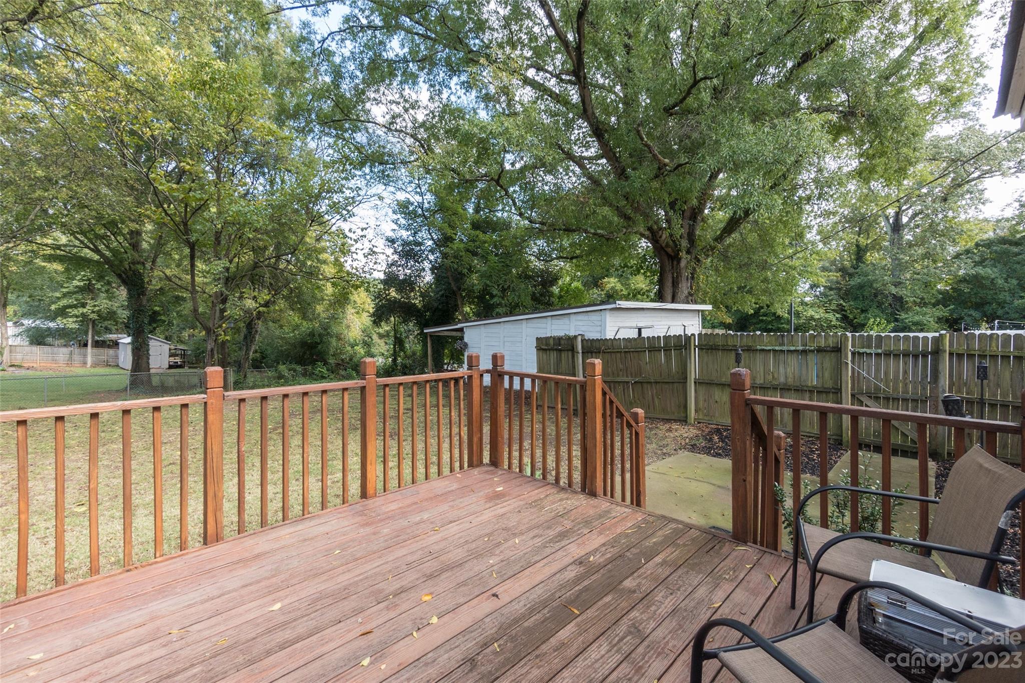 102 Grier Street Fort Mill, SC 29715 - Photo 40 of 47 a view of a wooden deck and a backyard