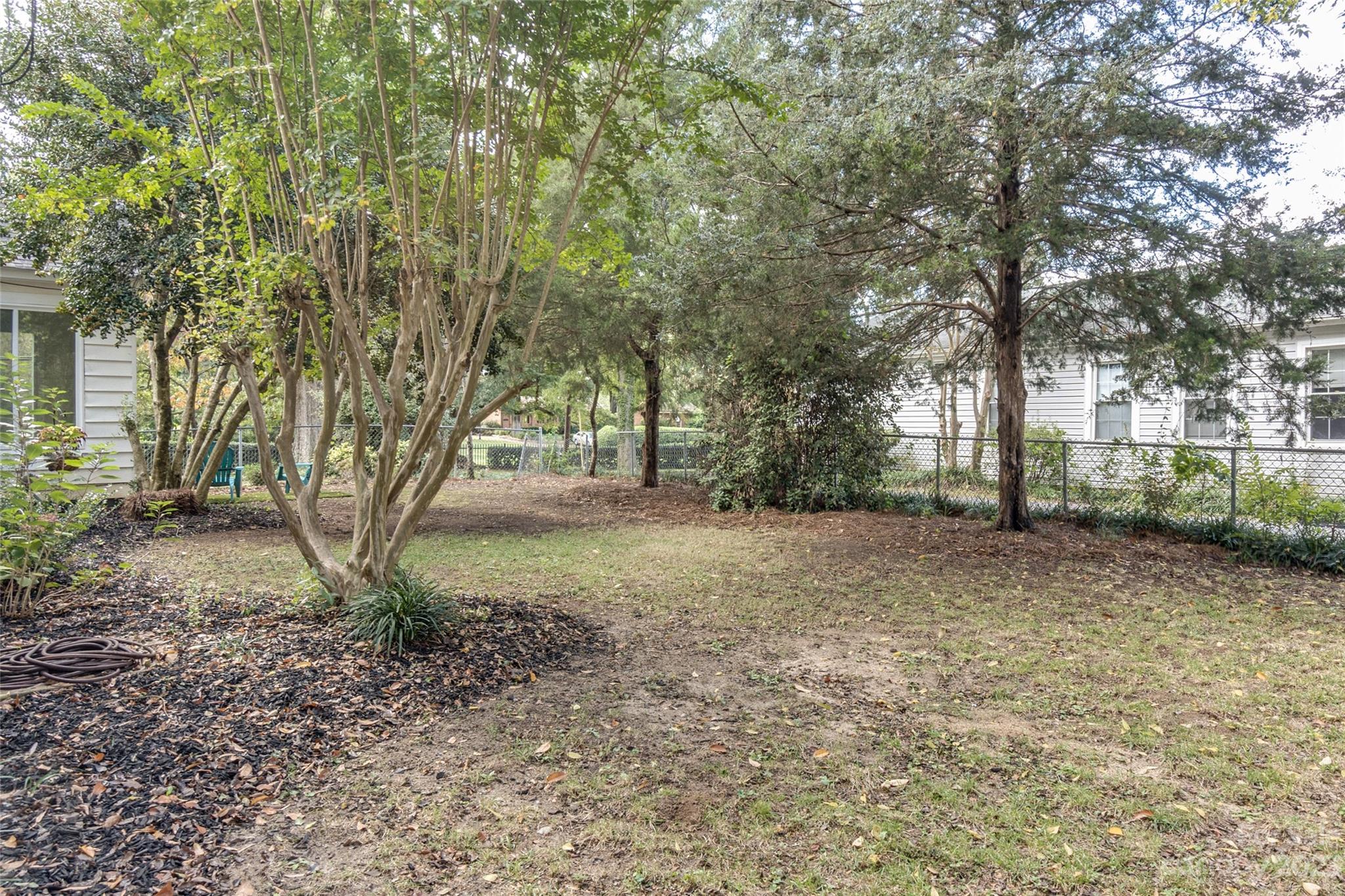 102 Grier Street Fort Mill, SC 29715 - Photo 42 of 47 a view of a yard with plants and trees