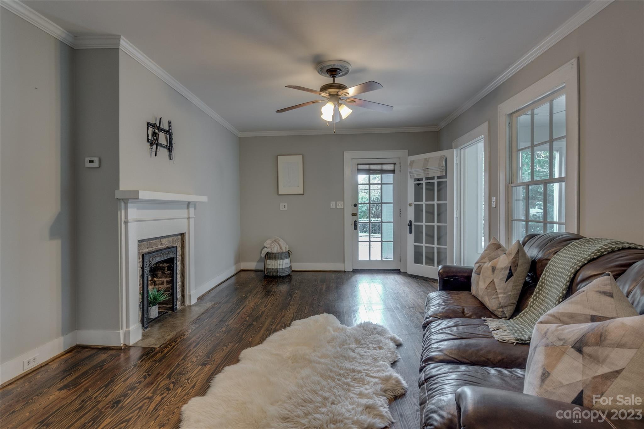 102 Grier Street Fort Mill, SC 29715 - Photo 7 of 47 a living room with furniture and a fireplace