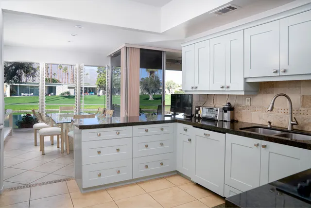 a room with furniture and a fireplace