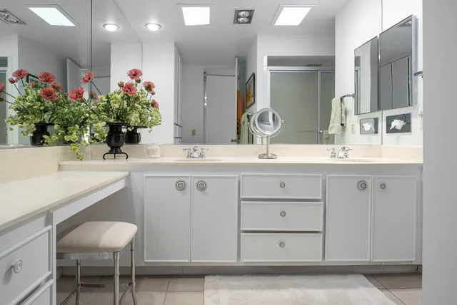 a bunch of flowers in front of a house