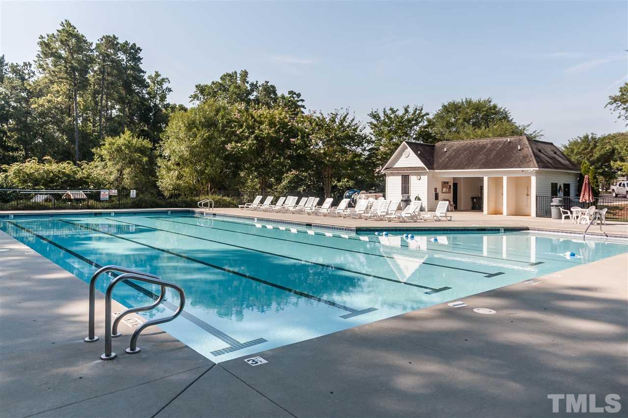 313 Grassy Point Road Apex, NC 27502 - Photo 23 of 25 This pool (one of two in the neighborhood) is almost directly across the street from this lovely home! From the front door, walk left across the lawn and across the street and you've arrived. Perfect enjoyment for all the summer days!