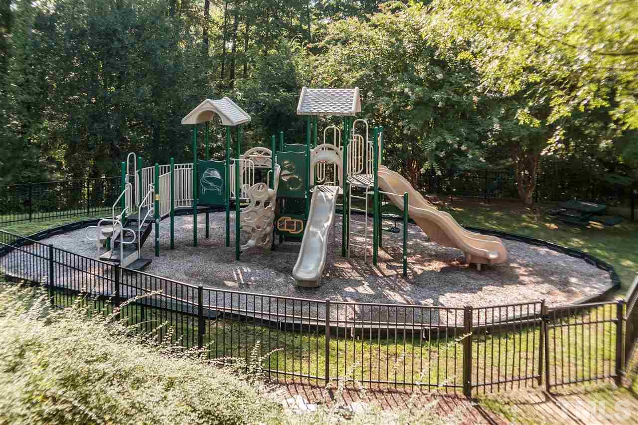 313 Grassy Point Road Apex, NC 27502 - Photo 24 of 25 This playground is almost directly across the street from this lovely home! From the front door, walk left across the lawn and across the street and you've arrived. Wonderful for kids...and their parents or grandparents too!