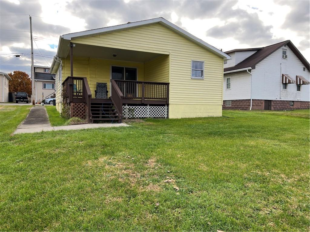 939 Orchard Street Rochester, PA 15074 - Photo 2 of 9 a view of a house with a yard and sitting area