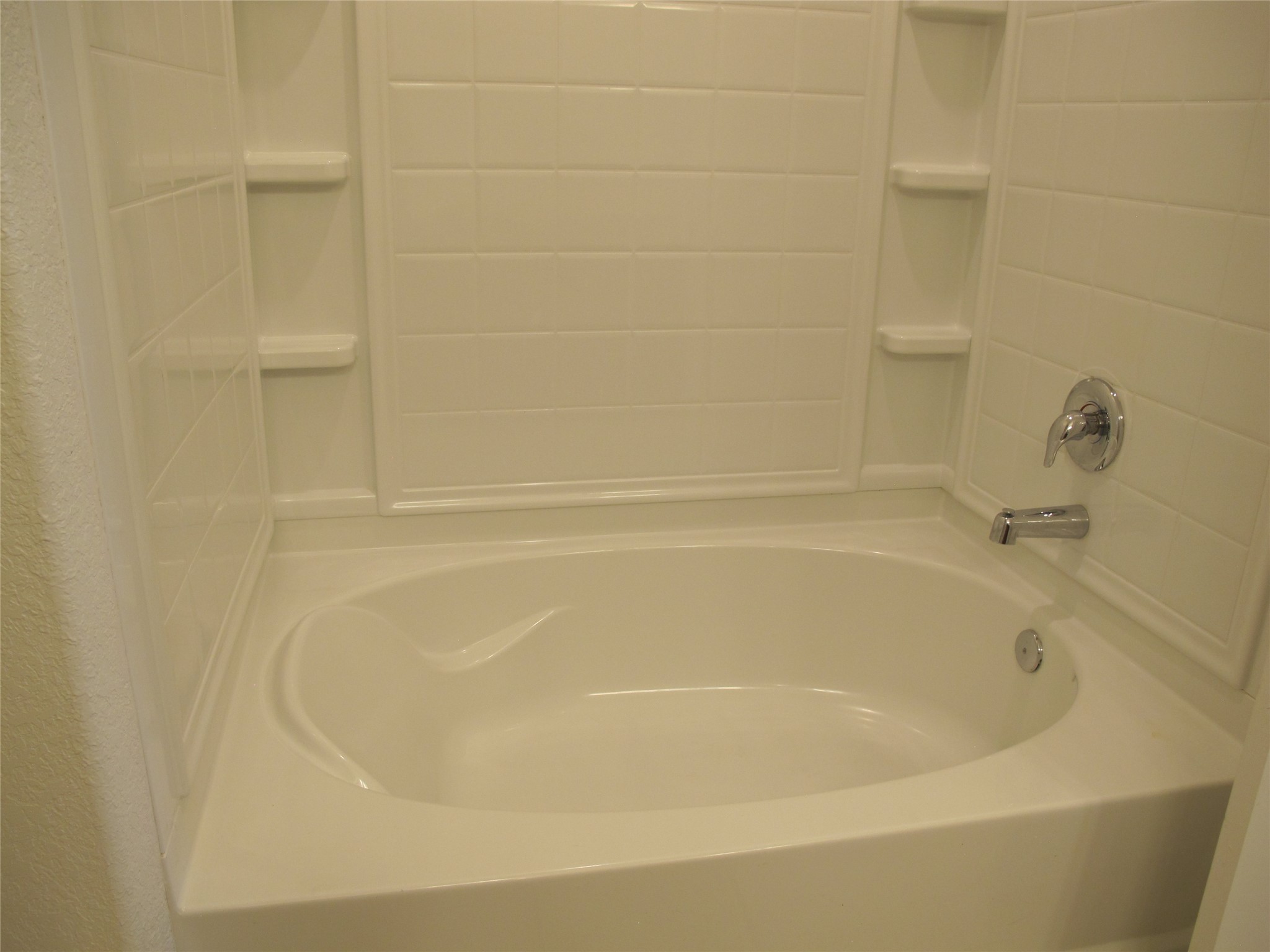 7820 Big Wind Way Austin, TX 78724 - Photo 23 of 37 Bathroom featuring bathing tub / shower combination