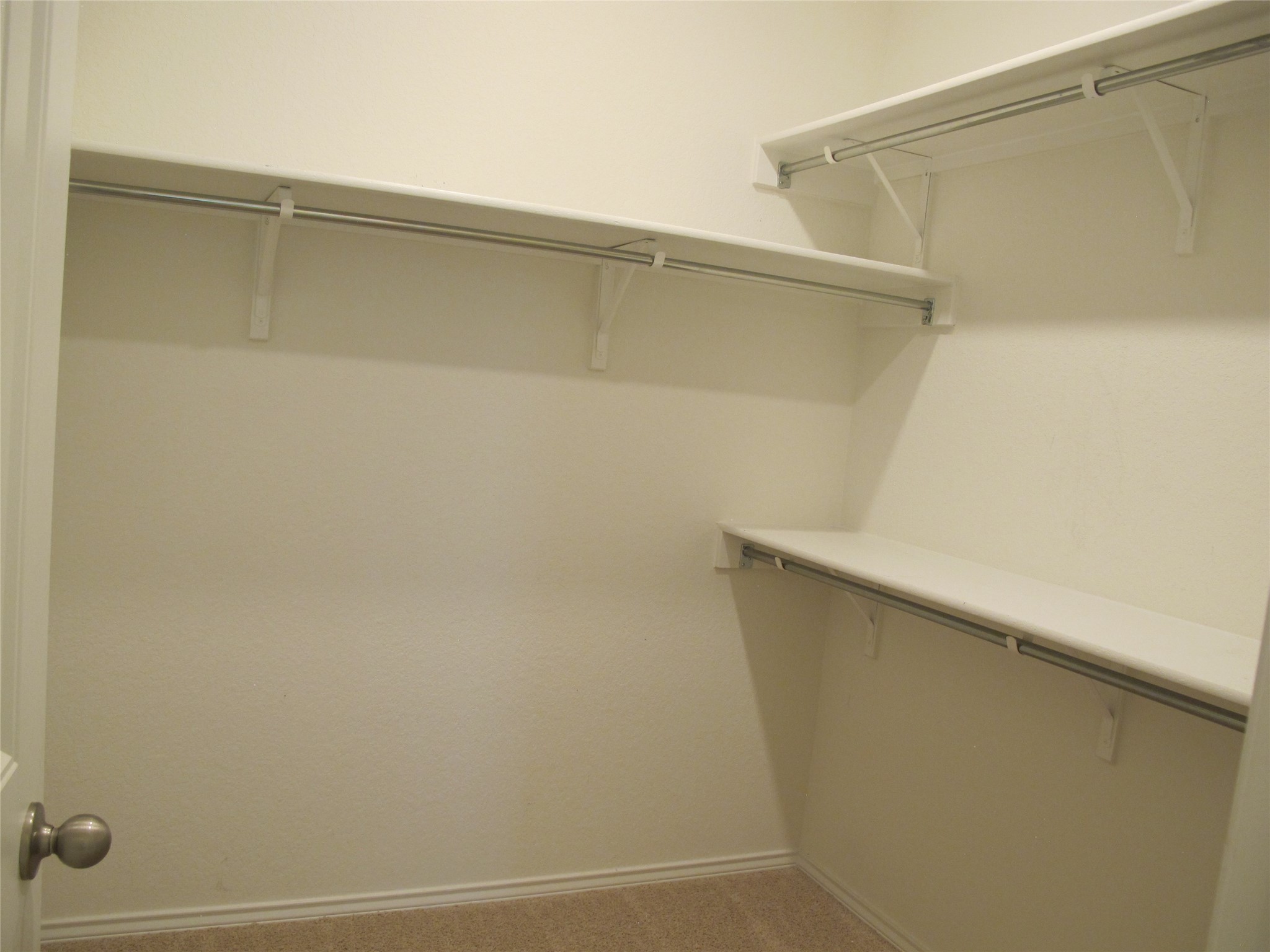 7820 Big Wind Way Austin, TX 78724 - Photo 24 of 37 Spacious closet featuring carpet floors
