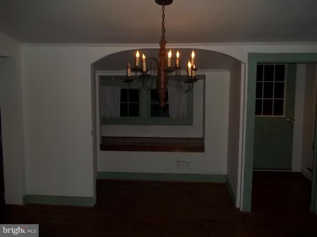 23005 Carrollton Road Neavitt, MD 21652 - Photo 12 of 21 a view of dining room and wooden floor
