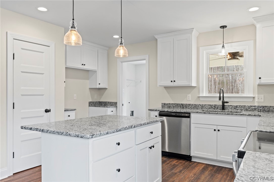 1548 Cartersville Road Goochland, VA 23063 - Photo 15 of 33 a kitchen with granite countertop a sink a stove refrigerator and cabinets