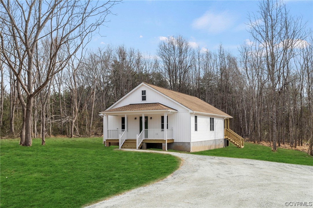 1548 Cartersville Road Goochland, VA 23063 - Photo 2 of 33 a view of a house with a yard