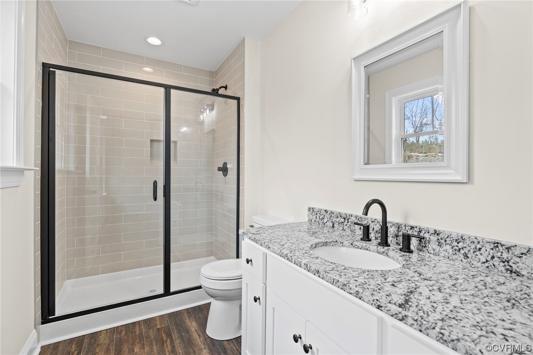 1548 Cartersville Road Goochland, VA 23063 - Photo 26 of 33 a bathroom with a granite countertop sink toilet and shower