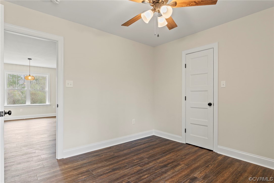 1548 Cartersville Road Goochland, VA 23063 - Photo 29 of 33 a view of an empty room with wooden floor and a window