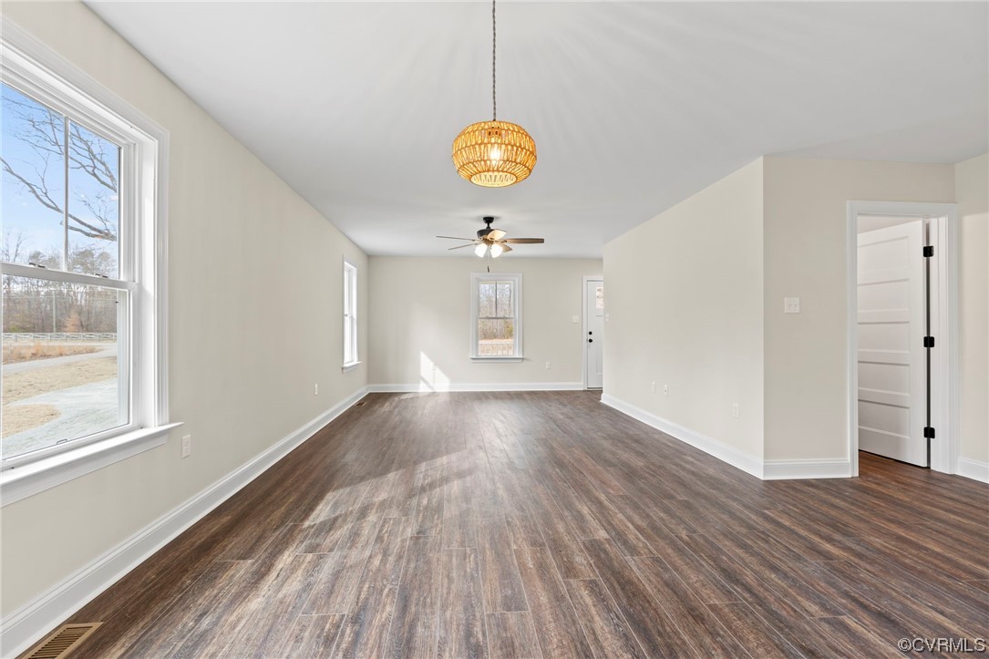 1548 Cartersville Road Goochland, VA 23063 - Photo 7 of 33 a view of an empty room with window and wooden floor