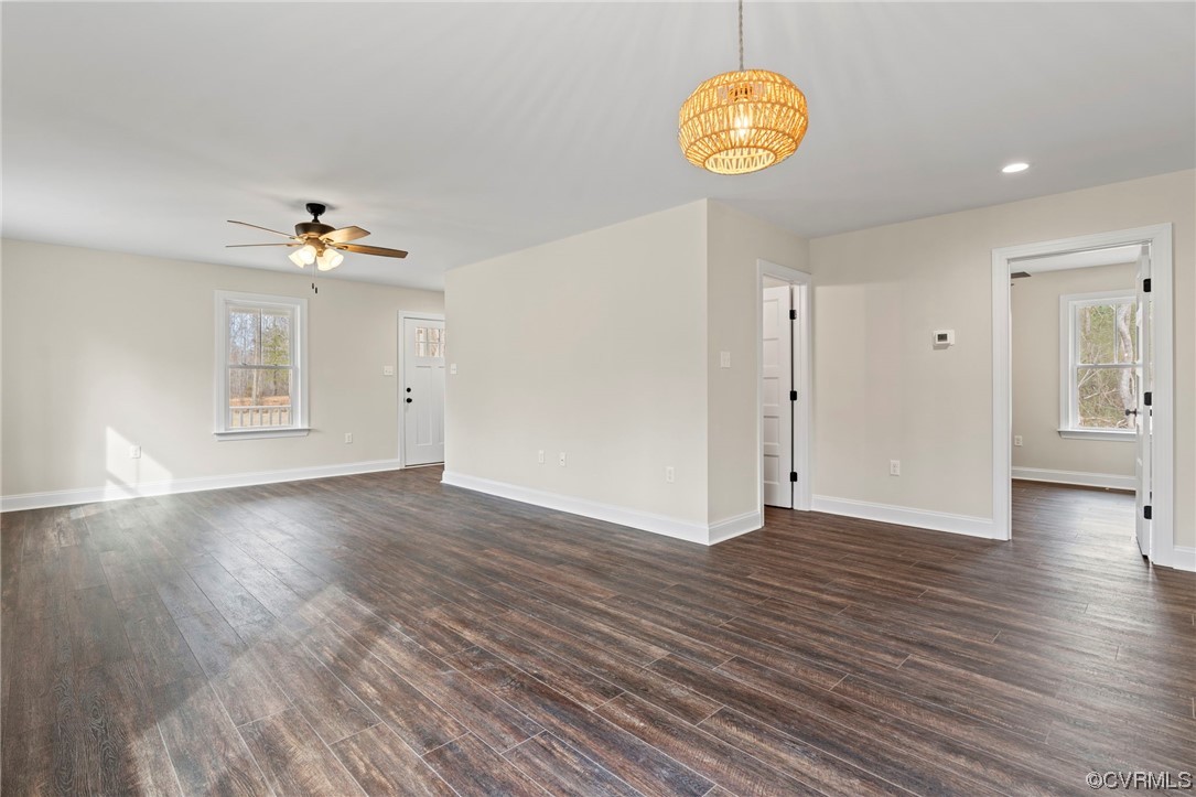 1548 Cartersville Road Goochland, VA 23063 - Photo 8 of 33 a view of an empty room with a window and wooden floor