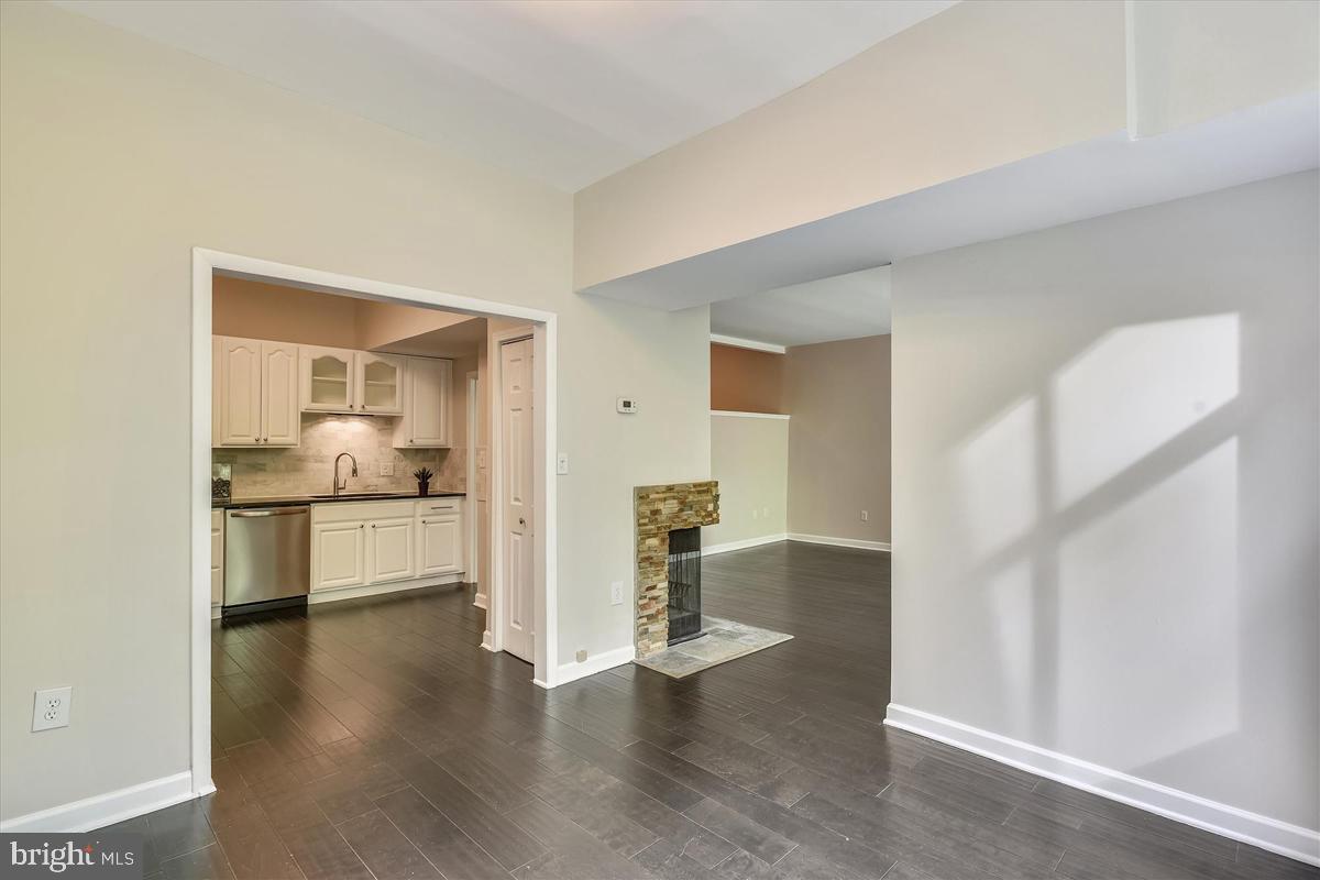 11564 Rolling Green Court, Unit 201 Reston, VA 20191 - Photo 12 of 29 Dining Room Opens to Kitchen & Living Room
