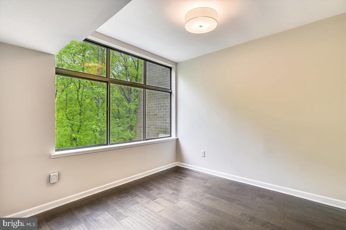 11564 Rolling Green Court, Unit 201 Reston, VA 20191 - Photo 14 of 29 High Ceiling & Wide-Plank Flooring