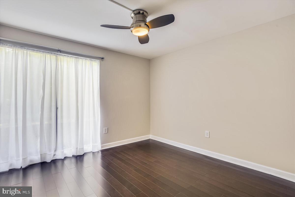 11564 Rolling Green Court, Unit 201 Reston, VA 20191 - Photo 21 of 29 Bedroom #2 w/ Wide-Plank Flooring