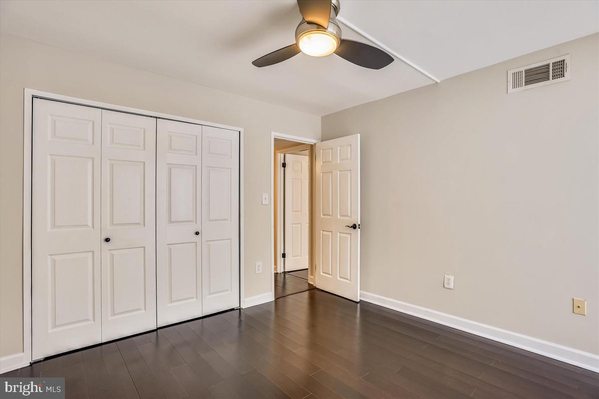 11564 Rolling Green Court, Unit 201 Reston, VA 20191 - Photo 22 of 29 Bedroom #2 w/ Double Closet & Ceiling Fan