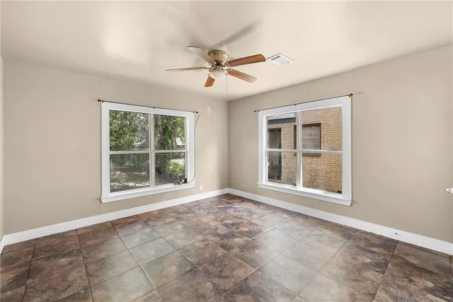 a bathroom with a toilet sink and shower