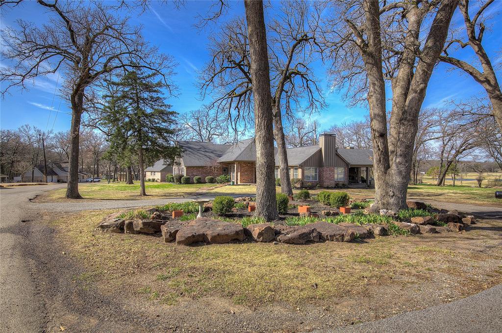 1079 Country Club Road Sulphur Springs, TX 75482 - Photo 3 of 40 a view of a yard with a tree