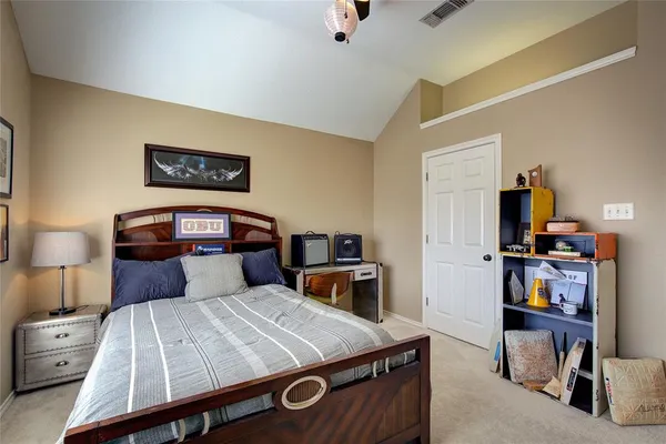 a bedroom with a bed and furniture