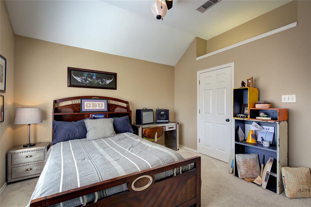 1079 Country Club Road Sulphur Springs, TX 75482 - Photo 35 of 40 a bedroom with a bed and furniture