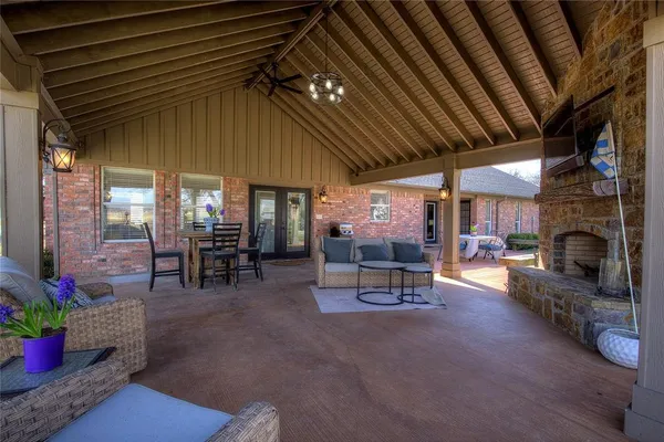 a view of a chairs and tables in patio