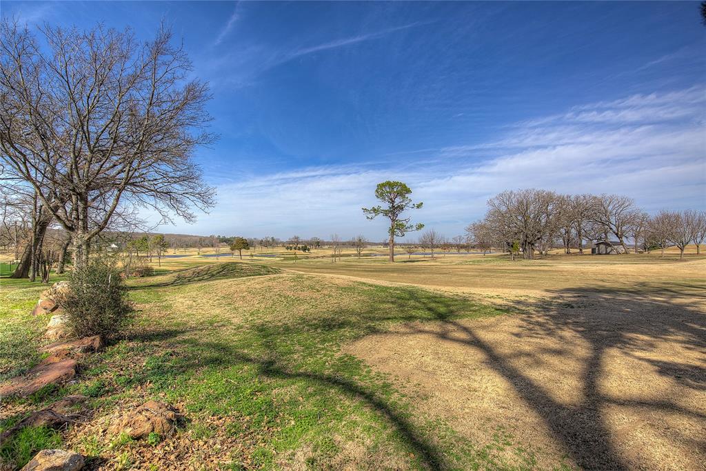 1079 Country Club Road Sulphur Springs, TX 75482 - Photo 39 of 40 a view of an ocean and a yard
