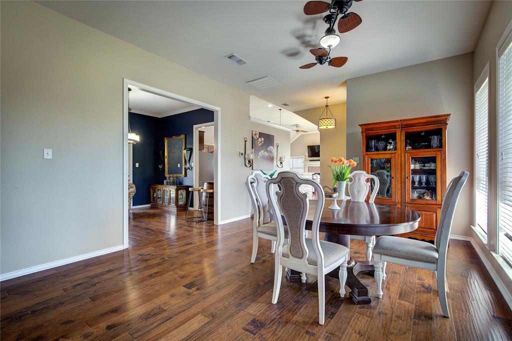 1079 Country Club Road Sulphur Springs, TX 75482 - Photo 6 of 40 a dining room with furniture entryway and wooden floor