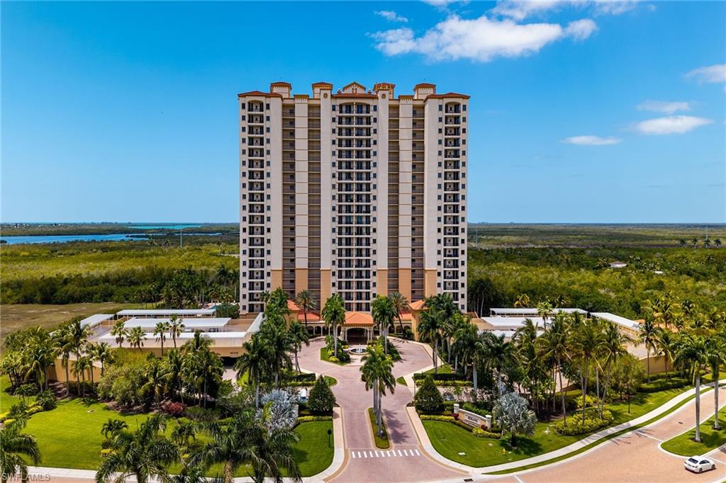1065 Borghese Lane, Unit 1003 Naples, FL 34114 - Photo 1 of 35 a view of a city with ocean view