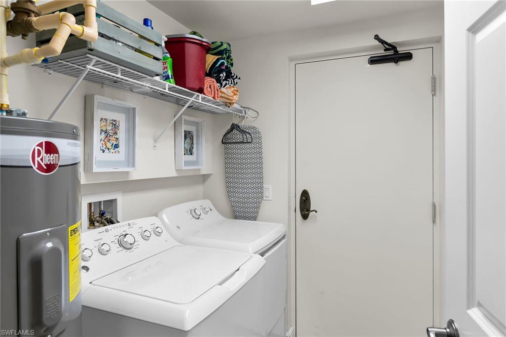1065 Borghese Lane, Unit 1003 Naples, FL 34114 - Photo 21 of 35 a utility room with dryer and washer