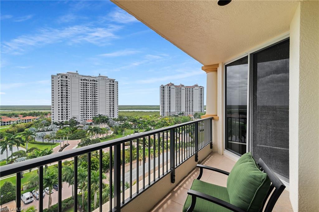 1065 Borghese Lane, Unit 1003 Naples, FL 34114 - Photo 26 of 35 a view of balcony with couch
