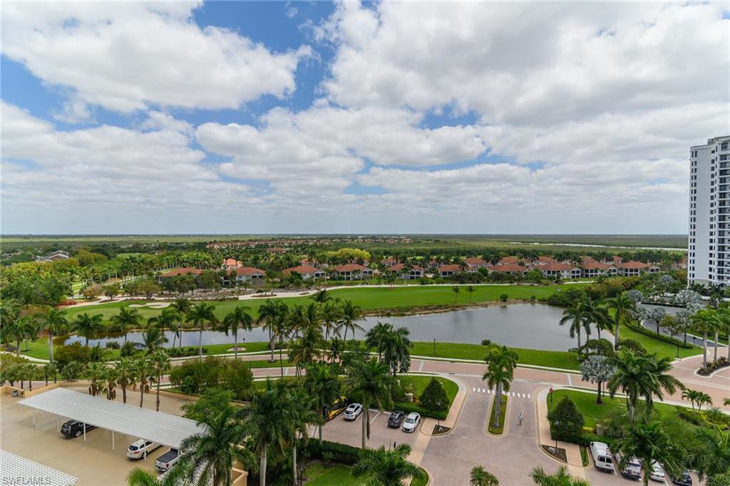 1065 Borghese Lane, Unit 1003 Naples, FL 34114 - Photo 31 of 35 a view of a city with a lake