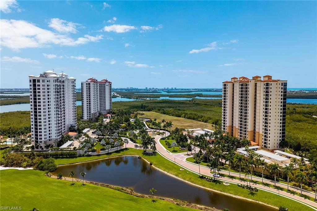 1065 Borghese Lane, Unit 1003 Naples, FL 34114 - Photo 33 of 35 a view of a city with tall buildings