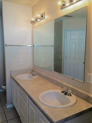 134 Sandstone Trail Crestview, FL 32539 - Photo 11 of 18 a bathroom with a sink and a mirror