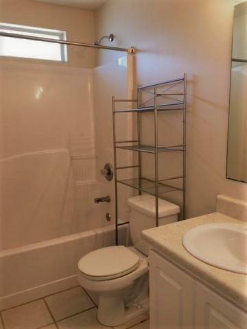 134 Sandstone Trail Crestview, FL 32539 - Photo 13 of 18 a bathroom with a toilet and a shower