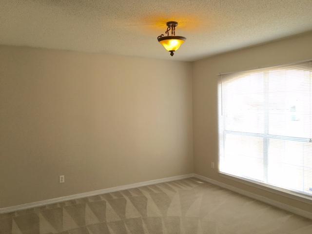 134 Sandstone Trail Crestview, FL 32539 - Photo 7 of 18 an empty room with a window