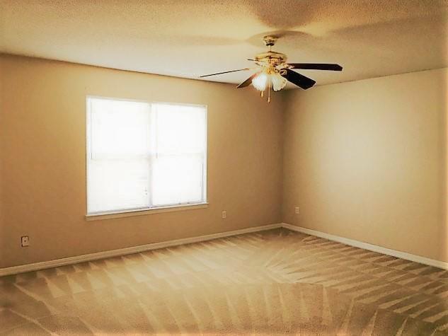 134 Sandstone Trail Crestview, FL 32539 - Photo 8 of 18 an empty room with a window